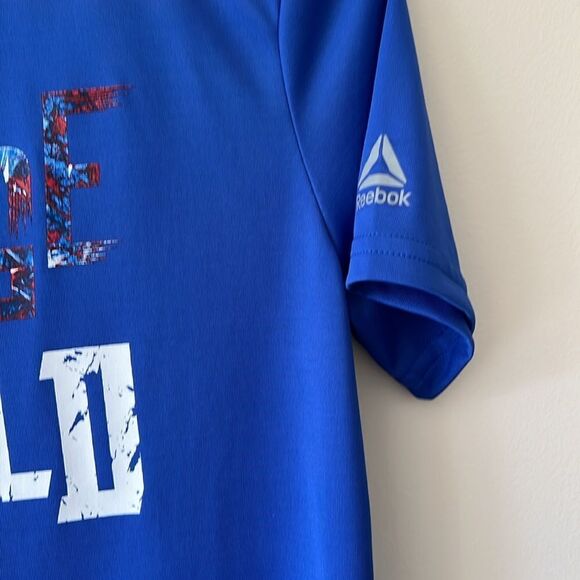 Reebok youth boys size 14-16 blue Savage on the Field shirt. - Picture 3 of 6